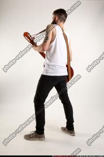 Oscar Playing Guitar