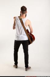 Oscar Playing Guitar