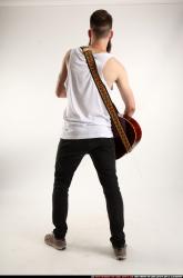 Oscar Playing Guitar