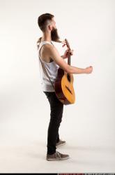 Oscar Playing Guitar