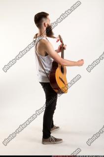 Oscar Playing Guitar