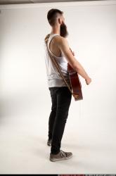 Oscar Playing Guitar