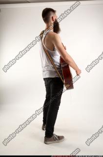 Oscar Playing Guitar