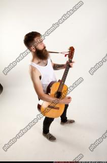 Oscar Playing Guitar