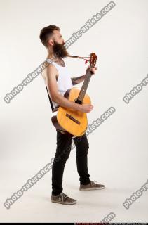 Oscar Playing Guitar