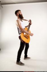 Oscar Playing Guitar