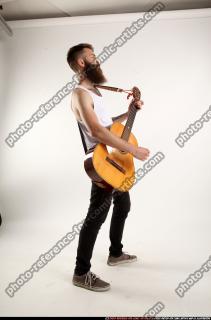 Oscar Playing Guitar