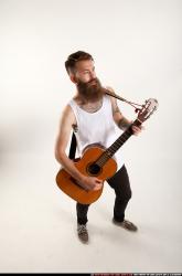 Oscar Playing Guitar