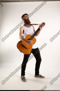 Oscar Playing Guitar