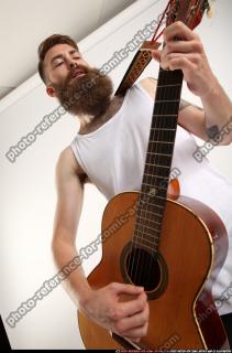 Oscar Playing Guitar