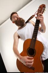 Oscar Playing Guitar