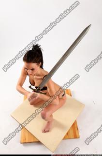 Peggy Kneeling Sword Pose