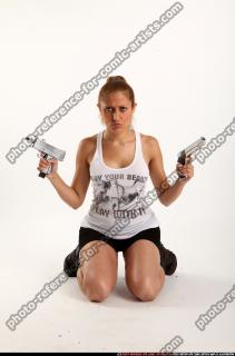 Agnes Kneeling Pose With Uzi