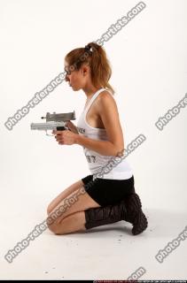 Agnes Kneeling Pose With Uzi