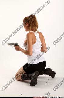Agnes Kneeling Pose With Uzi