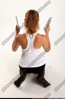 Agnes Kneeling Pose With Uzi