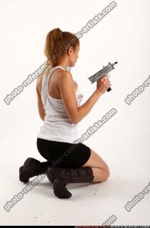 Agnes Kneeling Pose With Uzi