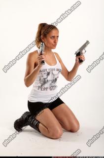 Agnes Kneeling Pose With Uzi