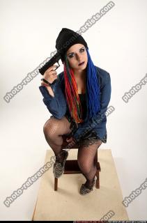 Dolores Sitting Pistol Pose