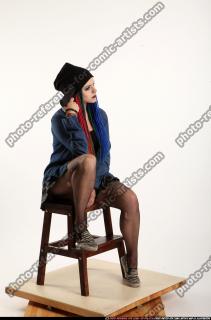 DOLORES SITTING PISTOL POSE 07 B